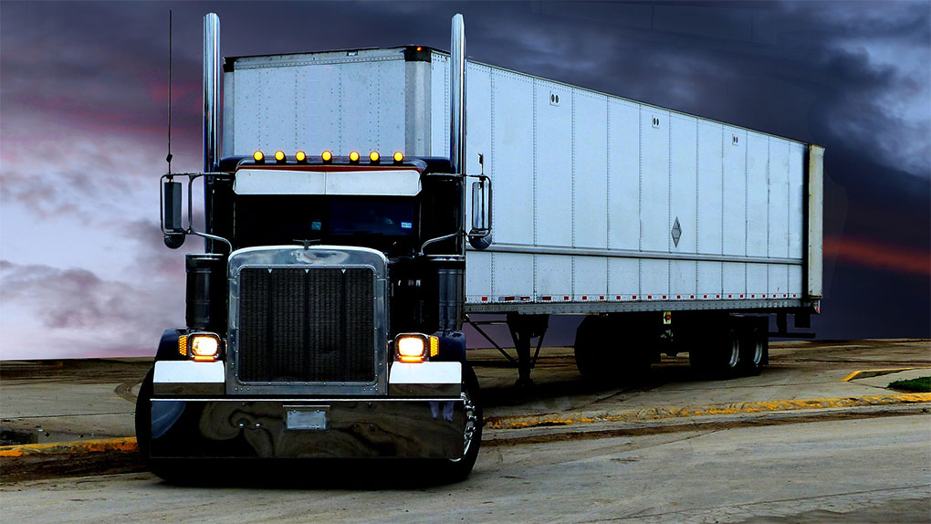 Texas Top Notch Trucking 18 wheeler truck with stormy skies